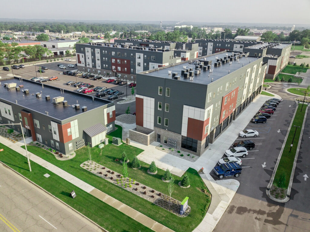 Aerial view of a group of affordable housing apartment buildings, called Grand View Place, in Grand Rapids, Michigan.