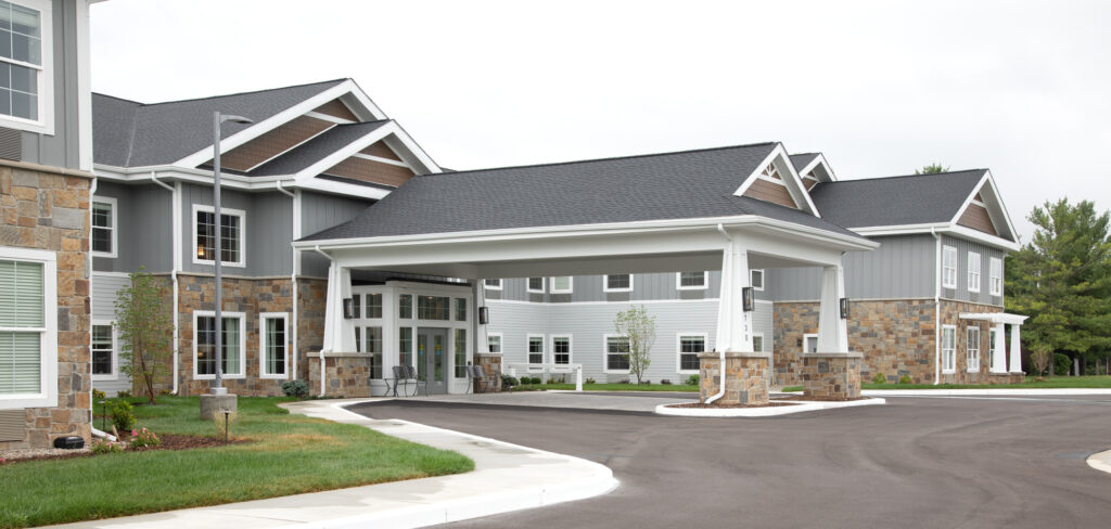 Side exterior view of Provision senior living building with front landscape