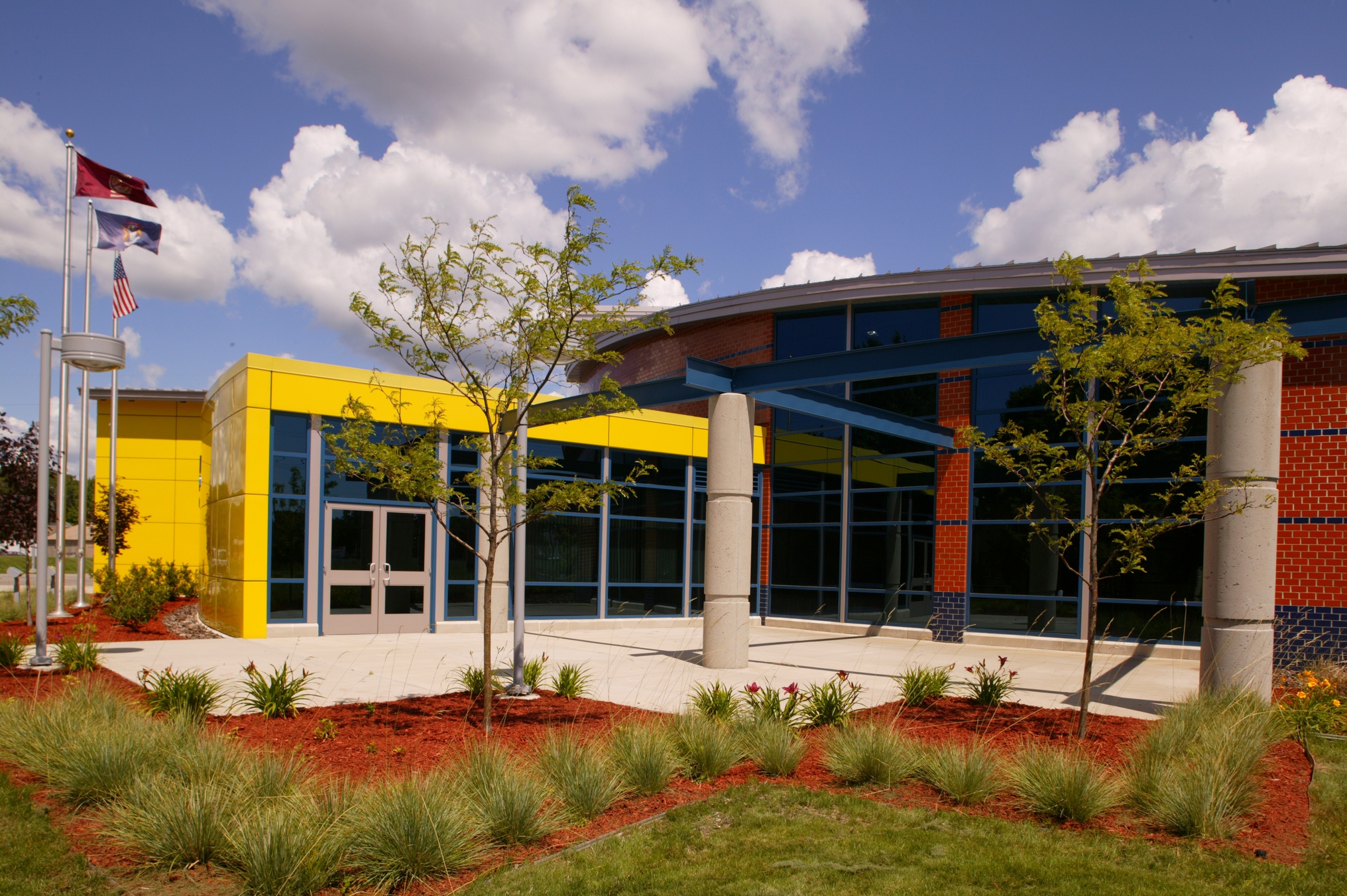 Building entrance with colorful yellow and blue structural design