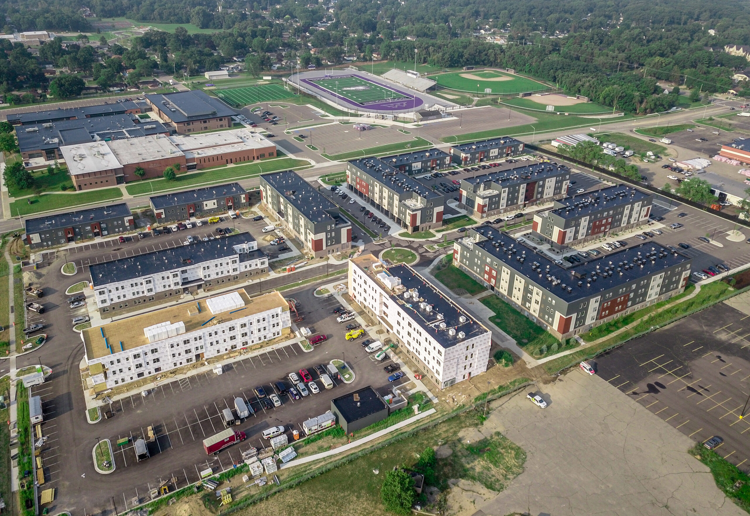Aerial view of the compound with multiple apartment style buildings constructed