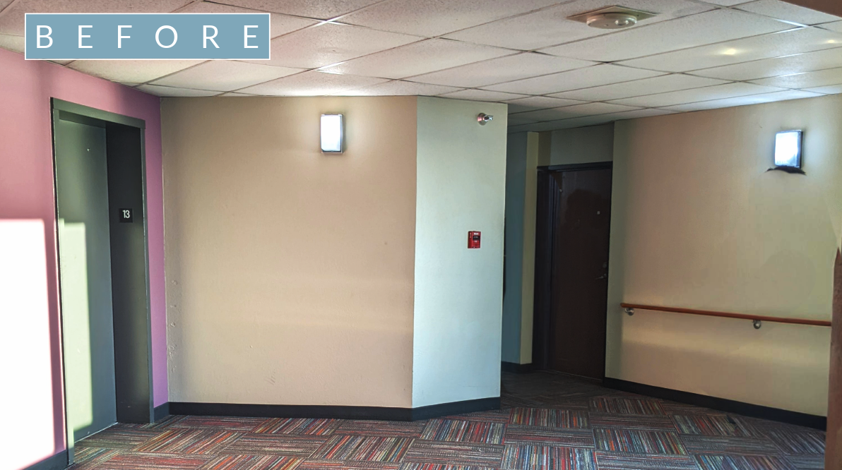 Before: Elevator Lobby - A blank canvas ready for transformation.